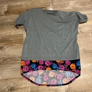 Lularoe women’s small gray top with flowers at the bottom